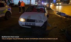 Bursa'da feci kaza: yola düşen telefonunu almaya çalışırken aracın altında kaldı!