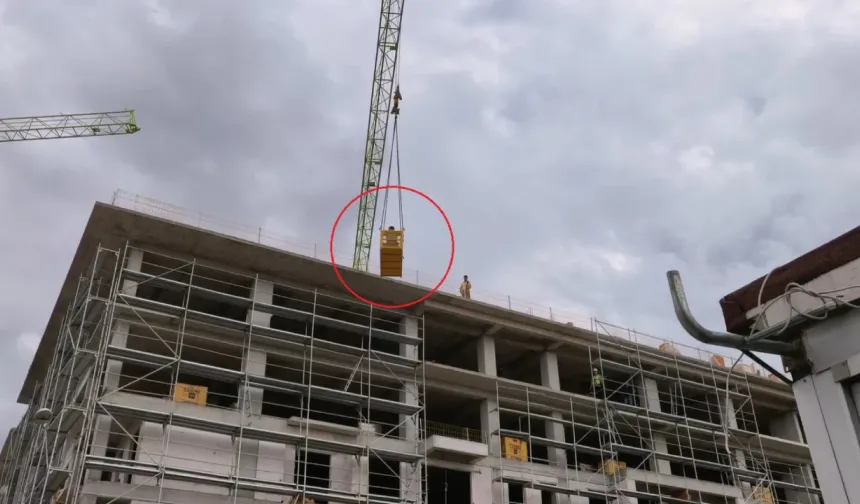 Bursa'da şantiyede sıra dışı tahliye! Vinç sepeti hayat kurtardı